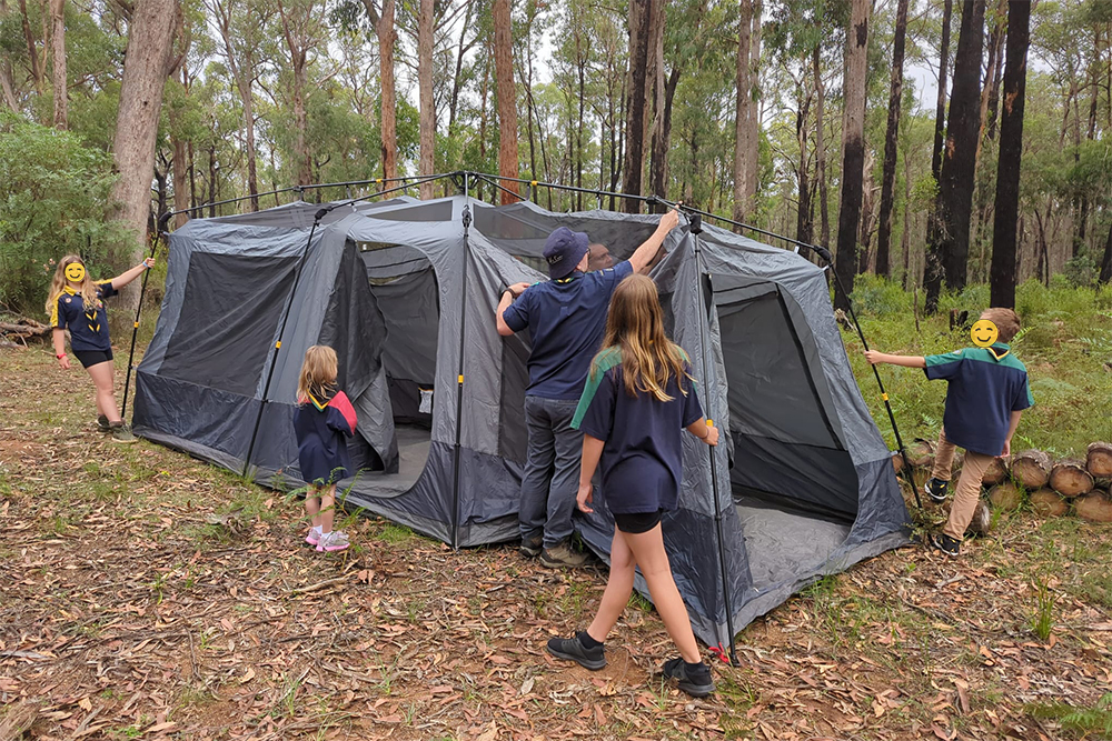 kids putting up a tent